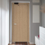 Corridor Interior With An Entrance Door In A Private House. Corridor Interior With An Entrance Door In A Private House.